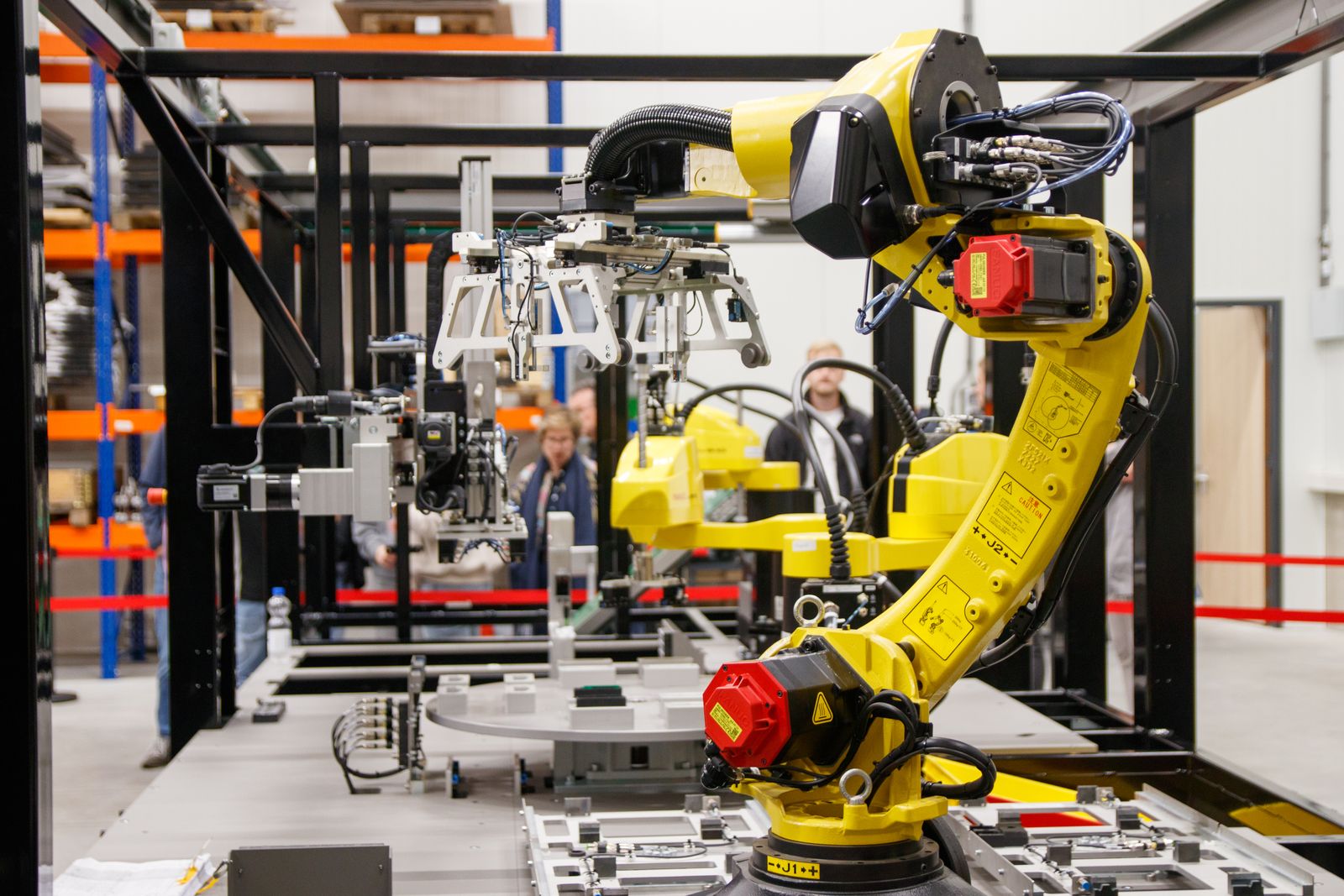 Industrial robot arm on a manufacturing line